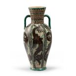 URN IN CERAMIC, S.LUCIA SIENA SECOND HALF 20TH CENTURY
green and brown glazing, pattern of dragons.