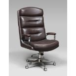 OFFICE ARMCHAIR IN LEATHER, 1970s
ribbon armrests and rotating feet with platic wheels. 
Size cm.