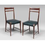 TWO CHAIRS IN BEECHWOOD, 1950s
with pierced backs.
Size cm. 95 x 44 x 44.