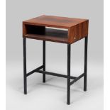 NIGHTSTAND, 1970s
in rosewood with lacquered metal legs and crossbeams.  
Size cm. 67 x 47 x 36.