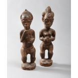 PAIR OF SCULPTURES OF ANCESTORS, YORUBA NIGERIA 20TH CENTURY
in wood. The offering figures are