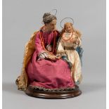 GROUP IN WAX, NAPLES LATE 19TH CENTURY depicting the Virgin and Saint Anna. Clothings in satin, with