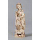 SCULPTURE IN IVORY, JAPAN LATE 19TH, EARLY 20TH CENTURY
depicting woman in kimono with basket of