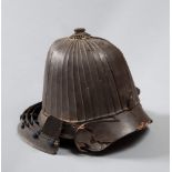 SAMURAI HELMET, JAPAN LATE 19TH CENTURY
in lacquered wood, trim in burnished metal.
Size cm. 25