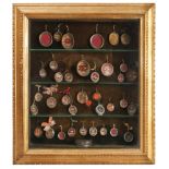 COLLECTION OF THIRTYSEVEN RELICS AND RELIC CASES, 18TH-19TH CENTURY

with metal frames, some with