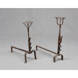 TWO ANDIRONS IN WROUGHT IRON, 18TH CENTURY

Size cm. 67 x 29 x 60 and cm. 87 x 25 x 57.