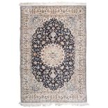 FINE NAIN NOVE CAPI RUG, MID 20TH CENTURY large medallion with secondary motifs with palmette and