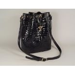 HANDBAG.
An Italian, black glazed crocodile handbag by Nuovo Bidente, Made in Italy for JB. Fully