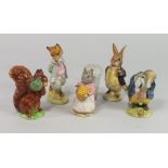 BESWICK.
Five Beswick Beatrix Potter figures, four with brown mark, one gold. CONDITION REPORTS:
