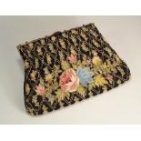 HANDBAG.
An embroidered & beaded evening bag with enamelled brass frame. CONDITION REPORTS: The