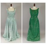 EVENING DRESSES.
A 1960's green & gold lame evening dress by Blanes & one other evening dress with