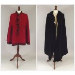 TWO CAPES.
An Edwardian black velvet evening cloak & a red wool cape. CONDITION REPORTS: 1. The