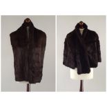 FUR STOLES.
A mink stole & a fur cape. CONDITION REPORTS: Both the cape and stole are in good,