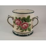 WEMYSS TYG.
A large pottery, rose decorated tyg by Wemyss (?) Height 19.5cm. Diameter 18.5cm.