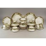 TEA SERVICE.
An Art Nouveau, bone china tea service for 12. CONDITION REPORTS: The milk and sugar