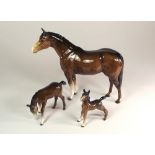 BESWICK.
A Beswick Pottery horse with two Beswick foals. CONDITION REPORTS: Smallest repaired.