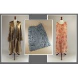 LADIES CLOTHING.
A lady's gold lame, fur trimmed evening coat, the blue silk lining very