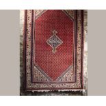RUG.
A Sereband rug. 128 x 196cm. CONDITION REPORTS: The rug is 20th century and could even be