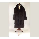 FUR COAT.
A mink fur coat. Length 100cm. CONDITION REPORTS: The coat is in generally good condition.