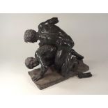 MARBLE SCULPTURE.
A mottled green marble sculpture of two wrestlers, some damage. Length 36cm,