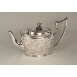 SILVER TEA POT.