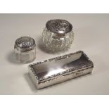 SILVER BOXES.
An Edwardian rectangular silver box, 10.5 x 4cm, Chester 1906, & two silver mounted