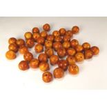 AMBER.
A quantity of loose amber beads. Approx. 53g. CONDITION REPORTS: The average bead size is