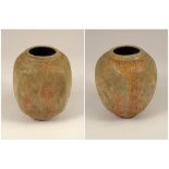 CHRIS CARTER.
A Chris Carter vase with bubbling glaze. Applied seal. Height 10cm.  CONDITION
