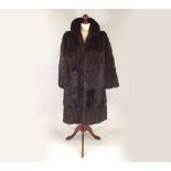 FUR COAT.
A mink fur coat. Length 100cm. CONDITION REPORTS: The coat is in generally good condition,