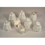 JELLY MOULDS & FUNNELS.
Six Shelley jelly moulds, tallest 7cm, a Nutbrown elephant pie funnel &