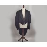 TAILCOAT.
A gentleman's evening tailcoat. CONDITION REPORTS: The tailcoat does not have a size on