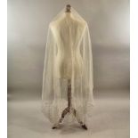 WEDDING VEILS.
An early 20th century cotton net wedding veil, with applied lace flowers & lace-