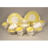 SHELLEY.
A Shelley, fine bone china part tea service for 12 (lacks sugar bowl), in the Butter Yellow
