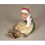 ROYAL COPENHAGEN.
A Royal Copenhagen figure, 'Flower Girl from Sealand' (Sjalland) from a series