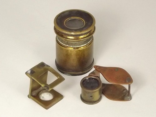 POCKET MAGNIFIERS ETC.
A brass yarn magnifier (for counting threads) & two other lenses. CONDITION