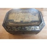 An exquisite c.1900 Chinese workbox, the black lacquer exterior with rich gilt motif including