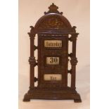 Art Nouveau design patinated brass rolling perpetual desk top calendar, day/date/month windows,