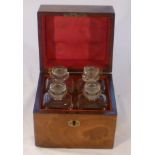 Georgian mahogany gentleman's toilet box fitted with four glass cologne bottles, leather lined,