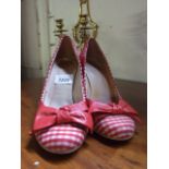 A PAIR OF RED AND WHITE CHEQUERED 1960s HIGH HEEL SHOES