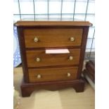 MINIATURE MAHOGANY CHEST OF THREE DRAWERS