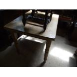 A PINE KITCHEN TABLE ON TURNED LEGS 41" X 31"