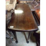 A 'D' ENDED DROP LEAF TABLE WITH BUN FEET