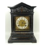 A Victorian ebonised cuckoo mantel clock