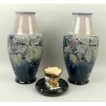 A pair of Royal Doulton stoneware vases