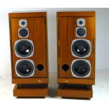 A pair of Castle teak veneered speakers