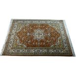 An Isphahan hand knotted wool rug, with