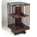 An Edwardian mahogany revolving bookcase