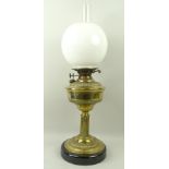 A Victorian brass column oil lamp with b