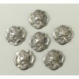 A set of six Art Nouveau silver buttons,