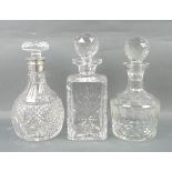 A group of cut glass decanters, comprisi